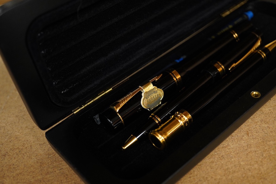 A quantity of various pens to include Parker Duofold and two Parker pen cases. Condition - varies